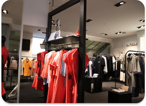 A clothing boutique interior with freshly painted walls and ceiling