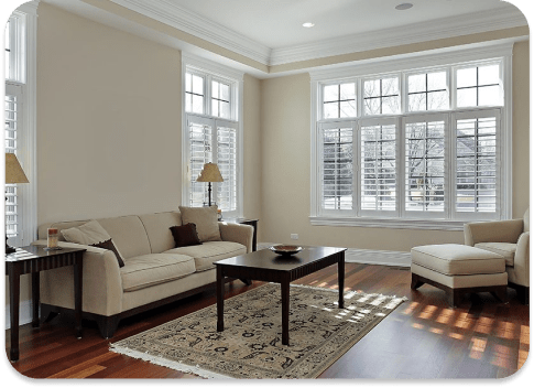 Realestate taupe living room with large windows